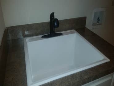 laundry sink and faucet