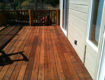 Photo(s) from Bones Painting Inc We striped old stain and applied new stain in Squaw Valley.The deck was old and worn down in Tahoe Donner. We sanded d