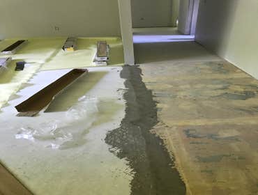 Photos by American Flooring Llc #3 We had to come, prep the flooring. Self level the bumps so the concrete would be flat. Put padding before the main i