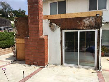 Deck rebuild/chimney removal Chimney removal, new wall with custom made Milguard windows and door.
New 2nd floor deck.