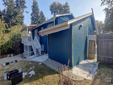 Saul's Quality Painting LLC Project #1 Initially Just a repainting of the home, later the client asked to add the painting of the deck to the job agree