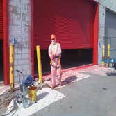 Exterior Painting of Manufacturing Plant One of the crews working on the exterior painting of a large manufacturing plant in Chicago area.