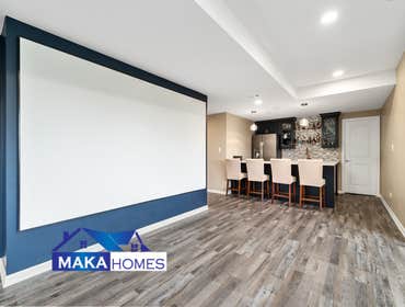 Photos by Maka Homes Inc #1 2000 sq ft with bathroom, bar, gym, theatre, and bedroom.