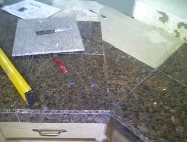 Othello Kitchen Granite/Porcelain Tile Work Kitchen Countertops and Backsplash done in Granite tile with hand beveled and polished edges and floors don