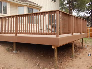 Trex Deck Dug holes and poured footings, framed deck structure and installed Trex decking, with Trex railing. Pre-drilled all screws.