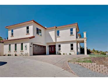 Spec Home in El Cajon, CA Demolition of an old condemned house and construction of a new Mediterranean spec home. 2700 s.f., two story hill-side high e