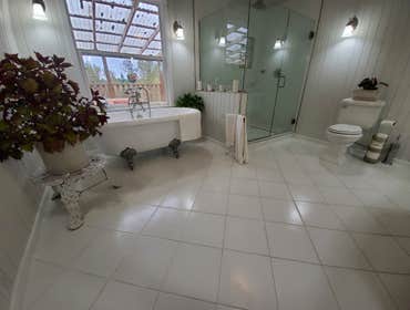 Photos by Blacks Enterprizes LLC #2 Is super clean crisp white very elegant bathroom single lady this was a complete kitchen before we converted it int