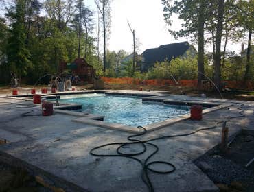 Photos from Crystal Blue Aquatics Llc New Construction of pool with full automation, LED lighting, high end travertine patio decking, beautiful water f