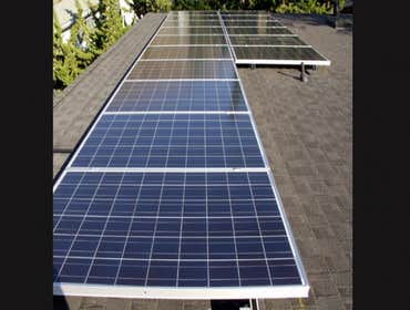 Installations Green Stock Solar ground-mounts and installations on comp, tile, and metal roofs!