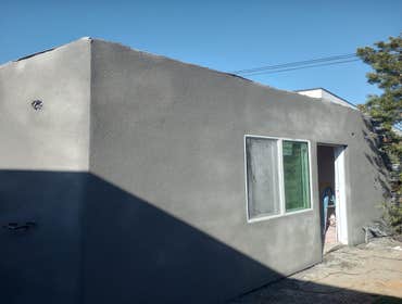 ADU - garage conversion 350 Sq ft old garage converted to studio ADU .
New slab foundation
Epoxy floor
Small kitchen
Bathroom