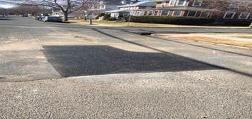 Road patched after repair