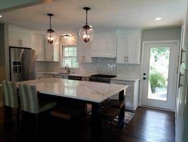 Olde Providence Creating open floor plan, new kitchen, sitting areas with pantries,new back door, refinished floors, new light fixtures