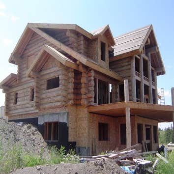 Log Home just West of Spokane, WA This beautiful log home is built using large Spruce logs. Average diameter is 16 to 18 inches.