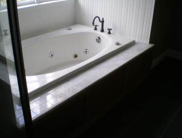 total bathroom rennovation. I first Built a custom vanity, then I tore out the old shower and replaced it with a new one. I also did the shower tile 