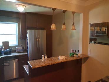 University Condo Remodel Condo renovation included repainting of all walls, replacement of bar lights, dining room light, replacement of master bedroo