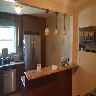 University Condo Remodel Condo renovation included repainting of all walls, replacement of bar lights, dining room light, replacement of master bedroo