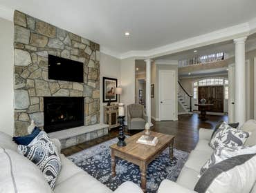 GULICK | CUSTOM Home in McLean The impressive stone and HardiePlank® elevation on our Winthrop really stood out on this corner lot of approximately one