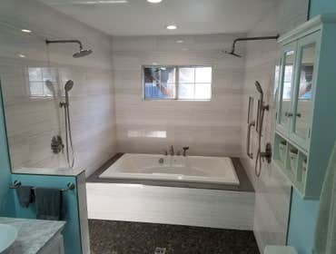 Bathrooms Remodel Custom massive shower with huge soaking hot tub inside shower. Dual shower head and dual rain head. City of Granada hill.