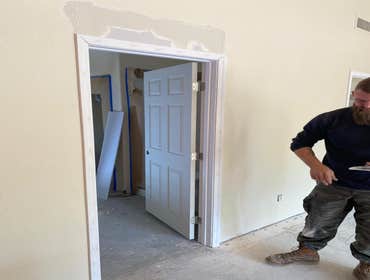 Photos by Rogue Contractors LLC #1 Customer wanted a door installed into a existing bathroom opening.