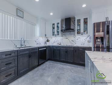 San Jose - Kitchen Remodel New contemporary kitchen design, including a gorgeous waterfall island and clear glass railings.