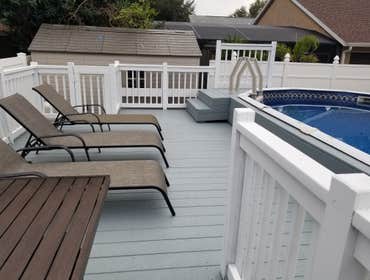 Rebuilt, lowered and increased size-Pool Deck/Added Platform Rebuilt, lowered and doubled the size of pool deck using existing and new wood. Also built