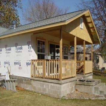 Comstock Room Addition and Back Porch This is a stud construction room addition with a back porch. Room size was 13' X 20' with 7' X 20 'porch system. 