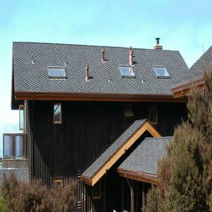 Pescadero Remove old roofing inspect for wood rot.Install new tar paper gutters and flashing.Install lifetime comp shingles.