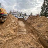 Photos by Asap Inc Replacement Septic System, Trenches being dug out.