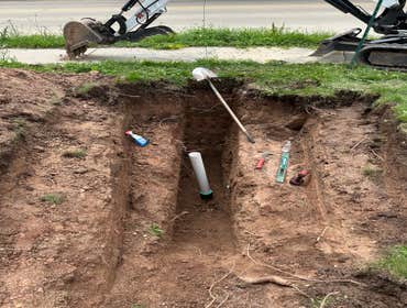 220 feet of Storm Sewer Install 200 feet of storm sewer connecting to 5 down spouts