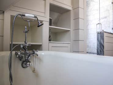 Baine Contracting Inc Project Multiple jobsites - showing kitchens, interior and exterior trim work, new homes, bathrooms, tile work, wood and iron ra