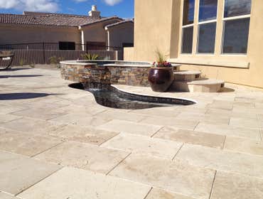 Reverse negative edge Travertine deck, spa, reverse negative edge play pool,