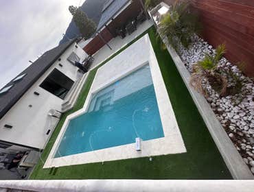 Photos by American Way Remodeling #1 New construction underground swimming pool.