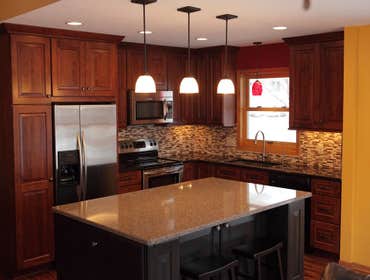 Photo(s) from New Creations Old tired kitchen was remodeled with this stunning result.