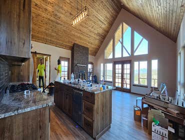 Photos by Wethered Timberworks LLC Dba Wethered Construction #1 Custom Home