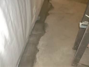 Basement Waterproofing Homeowners of an Oakmont PA residency had water infiltration in their unfinished basement. Water was coming in along the stone 