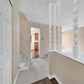 Photos by KM Services #2 Took out all carpet, painted floors with KILZ. Repaired damage to walls and trim, sprayed 9 rooms and trim...2 days after fini