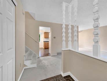 Photos by KM Services #2 Took out all carpet, painted floors with KILZ. Repaired damage to walls and trim, sprayed 9 rooms and trim...2 days after fini