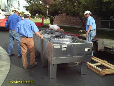Dry Cooler Installation New dry Cooler on the roof of a comercial building