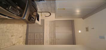 Laundry room cabinet refinishing