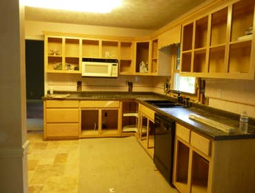 Kitchen Remodel Cabinets painted, walls with faux finish, new granite countertops, new tile travertine floors and backsplash, recessed lighting, under 