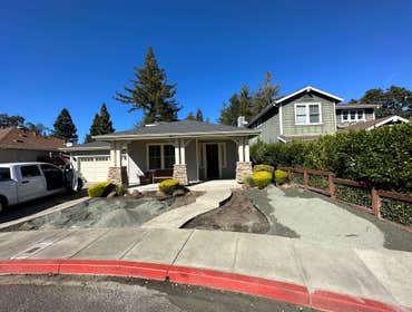 Photos by American Remodels Inc #1 Here we designed the house to a more modern contemporary style with bluestone accents. The driveway and walkways wer