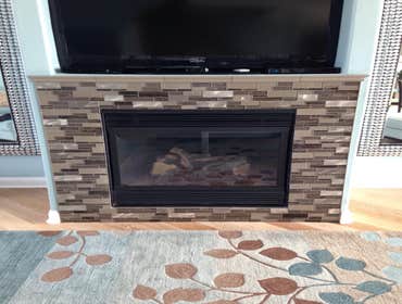 Tiled fireplace surround