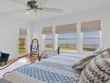 Bells River Residence Nestled in the serene Waterman’s Bluff in Yulee, FL, this exquisite home offers 3,046 sq ft of living space, expanding to a total