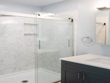 Berkeley Hill Bathroom Remodel Complete bathroom remodel. Shower has full length granite slabs.