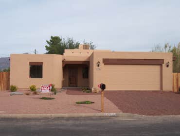 Custom House This a beutiful 1500 sq. ft.spec house we did. 3 bdrm, 2 bath, rounded walss, copper sinks, travertine flooring, granite countertops.