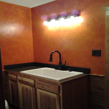 Nuroom Remodeling Rustic Bath Project Gallery Rustic bath with Venetian texture walls, blending of modern materials with rustic country charm.