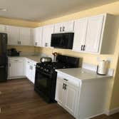 Photos by C W General Construction Inc #3 Installed this island refinished all the cabinets and new quartz tops to give it the final tpuch