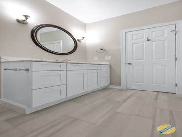 Contemporary/Traditional Bathroom Today we have a contemporary bathroom with a traditional twist! We loved how the modern color scheme contrasted the t