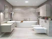 Custom home with wall mount toilet and bidet, soaking tub, floating sink cabinet. Westlake Hills