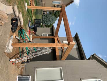 Covered patio with composite deck Hawley Construction LLC #10 Built a large composite deck with with aluminum hand rails, a custom trellis with privac